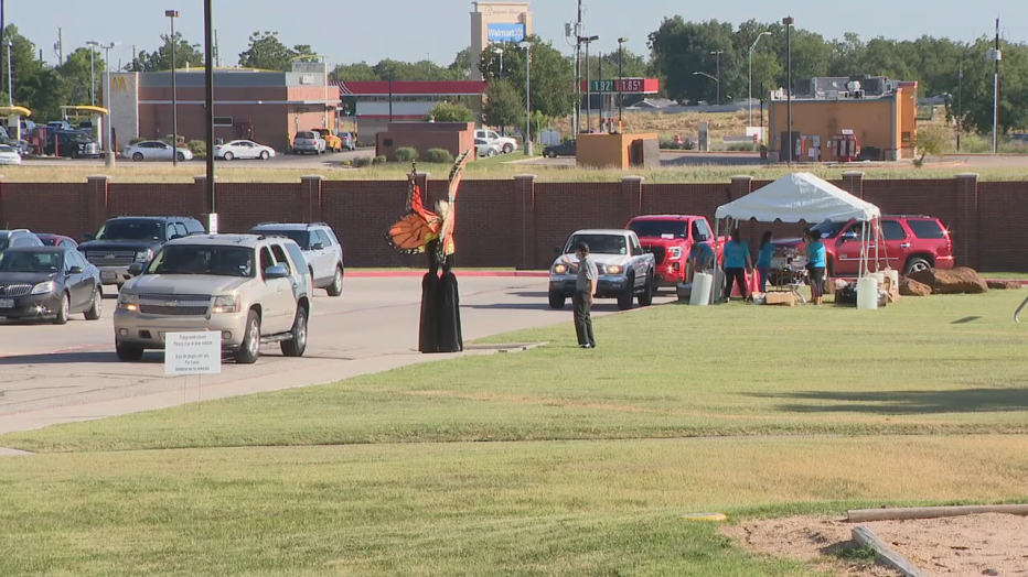 Drive-thru back to school events held across Fort Worth to help families prepare for virtual learning